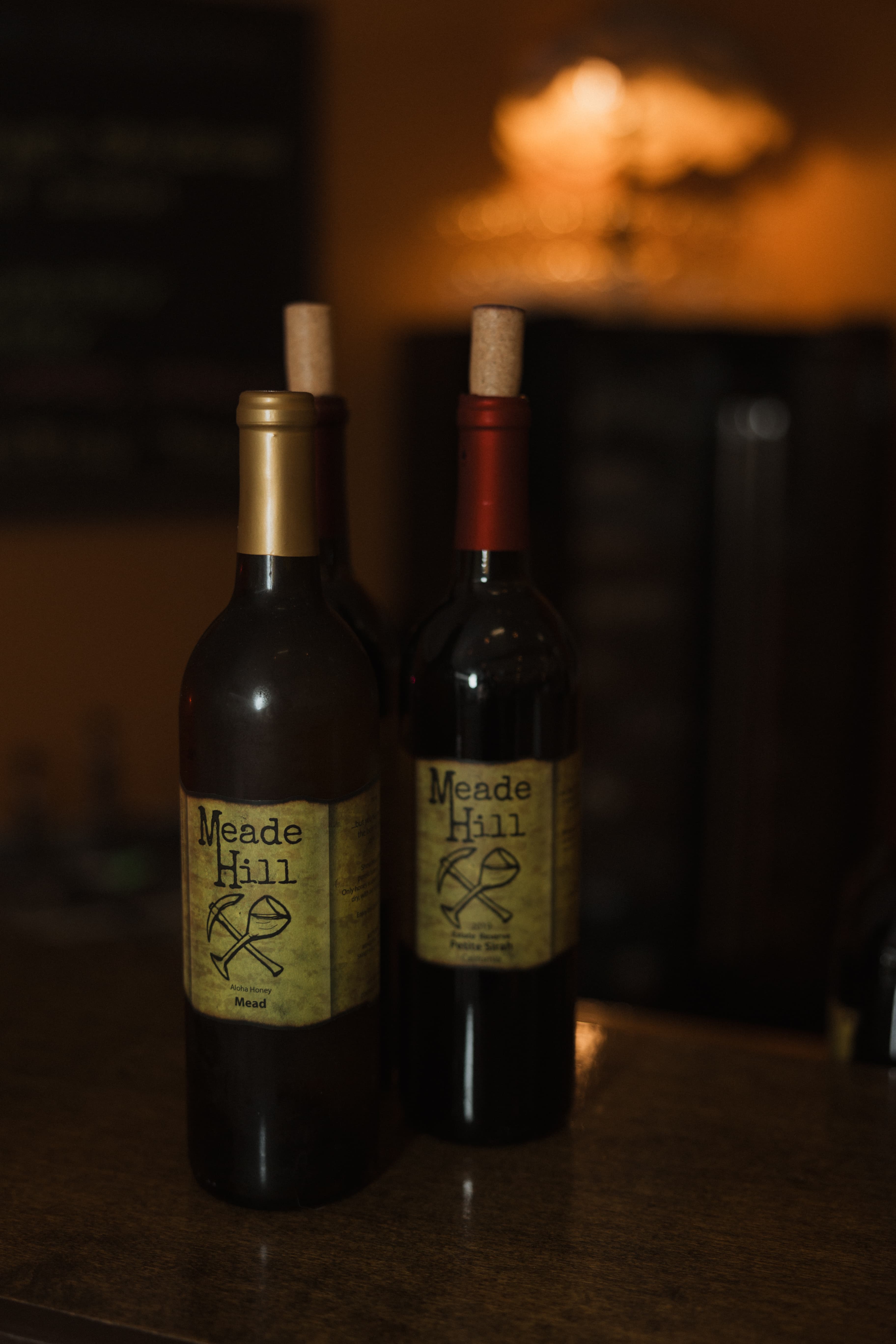 Bottles of wine and mead set up for an event at Wild Loon Winery